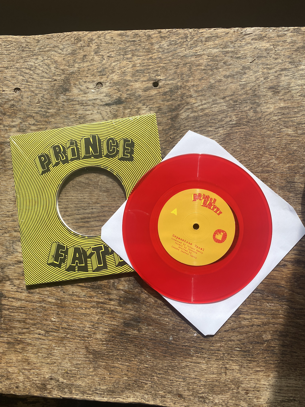 Single: EXPANSIONS 7-inch red vinyl + digital